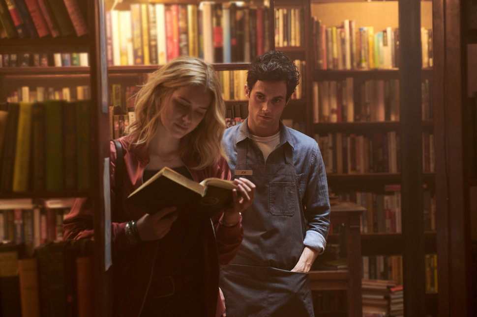 Elizabeth Lail and Penn Badgley in the pilot episode of "You."