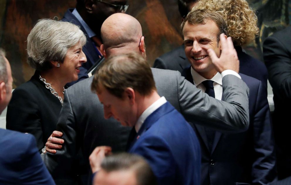 PHOTO: Britains Prime Minister Teresa May, left, and Belgiums Prime Minister Charles Michel, center, greet Frances President Emmanuel Macron, right, at the start of the United Nations Security Council meeting in New York, Sept. 26, 2018.