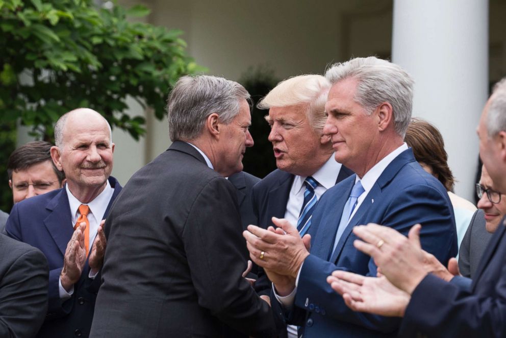 PHOTO: Rep. Mark Meadows shakes hands with President Trump, at the press conference with members of the GOP, on the passage of legislation to roll back the Affordable Care Act, in the Rose Garden of the White House, May 4, 2017. 