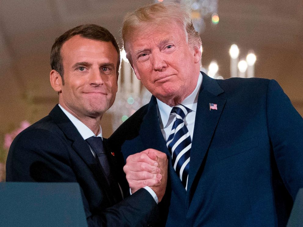 PHOTO: President Donald Trump and French President Emmanuel Macron embrace at the conclusion of a news conference in the East Room of the White House in Washington, April 24, 2018.