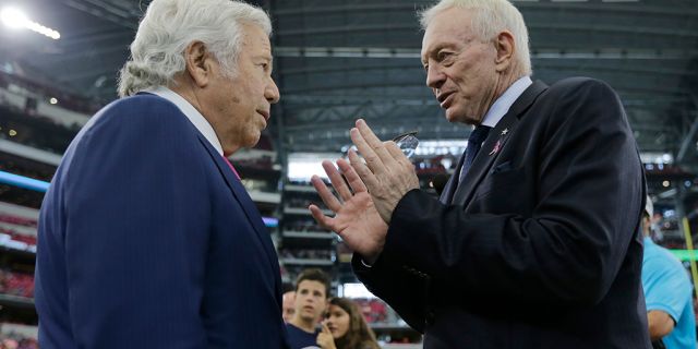 New England Patriots owner Robert Kraft alks with Dallas Cowboys owner Jerry Jones before the game on Sunday, Oct. 11, 2015, in Arlington, Texas. 