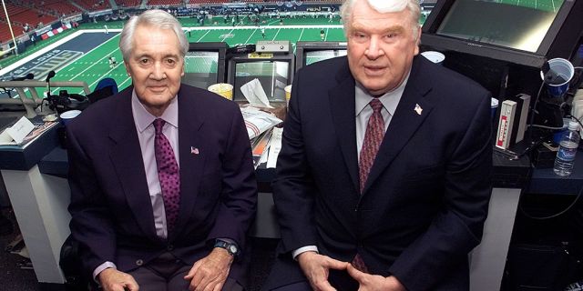 Pat Summerall and John Madden in the FOX broadcast booth before the NFC divisional playoff game on Jan. 20, 2002.