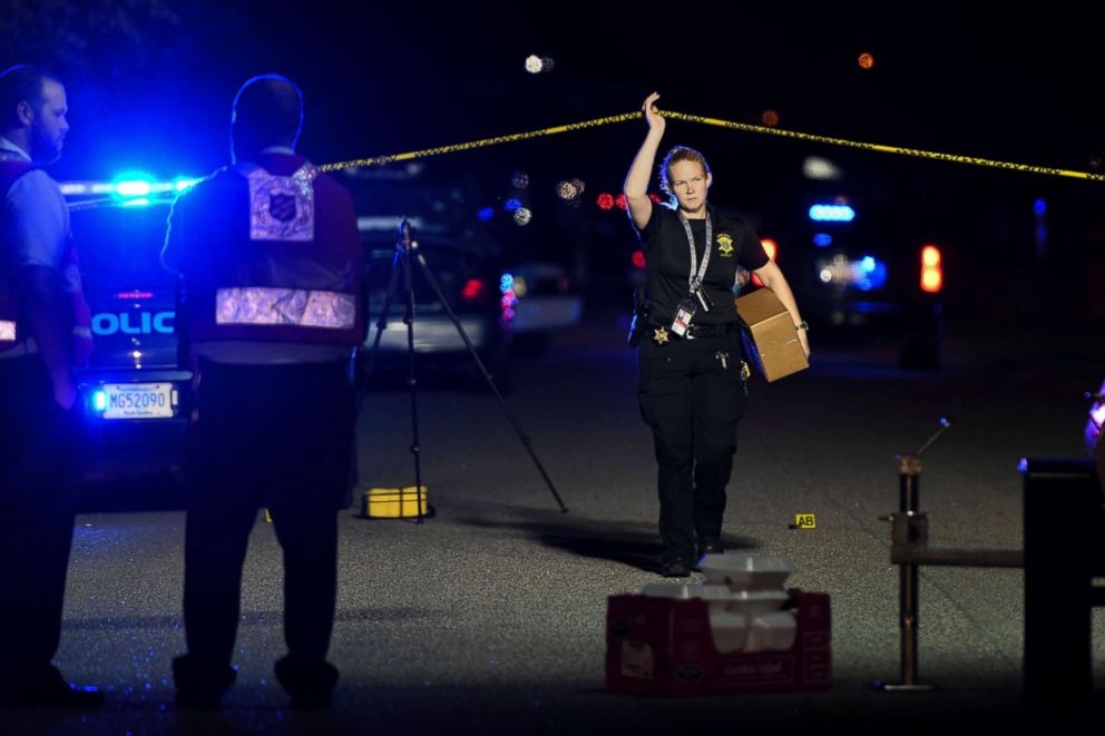 PHOTO: A member of the sheriffs department exits the crime scene on Ashton Drive in the Vintage Place neighborhood where several members of law enforcement were shot, one fatally, Oct. 3, 2018, in Florence, S.C.