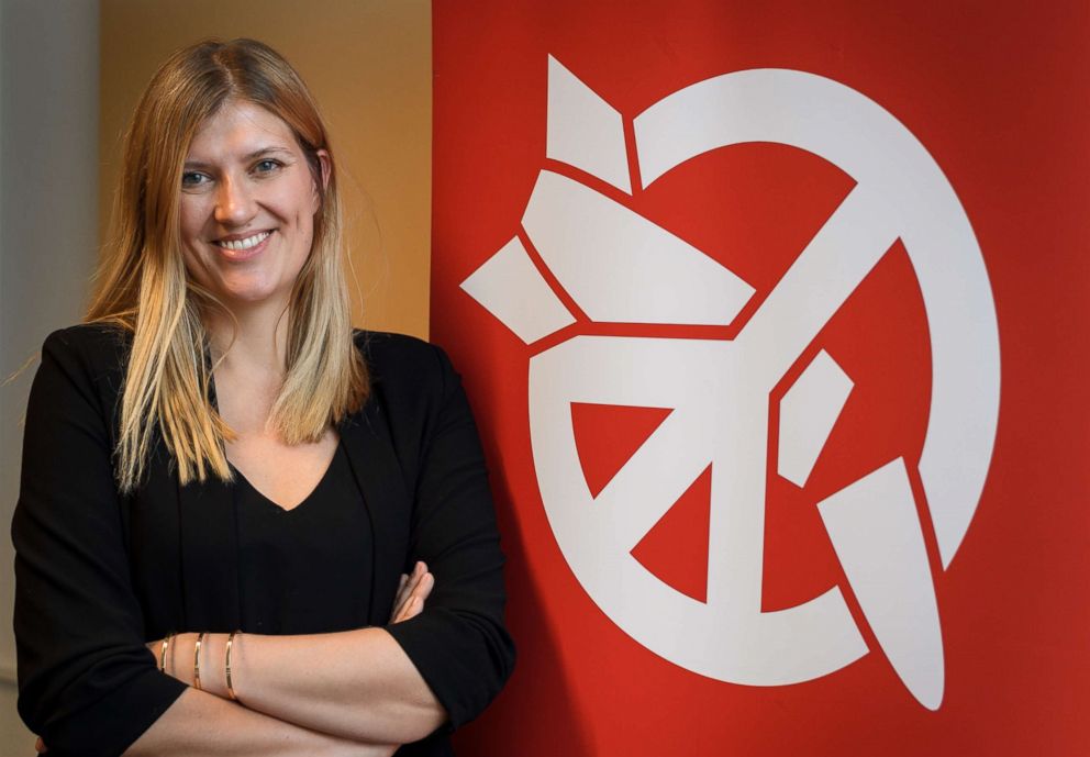 PHOTO: Beatrice Fihn, executive director of 2017 Nobel Peace Prize-winning International Campaign to Abolish Nuclear Weapons (ICAN), poses next to the ICAN logo at their headquarters, Nov. 30, 2017, in Geneva.