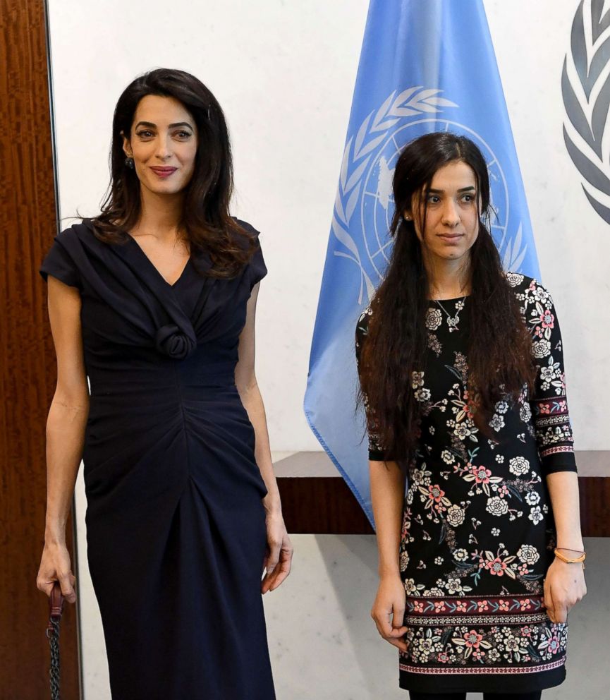 PHOTO: Nadia Murad, right, public advocate for the Yazidi community in Iraq and survivor of sexual enslavement by the Islamic State jihadists, stands next to lawyer Amal Clooney at the UN Headquarters in New York City.