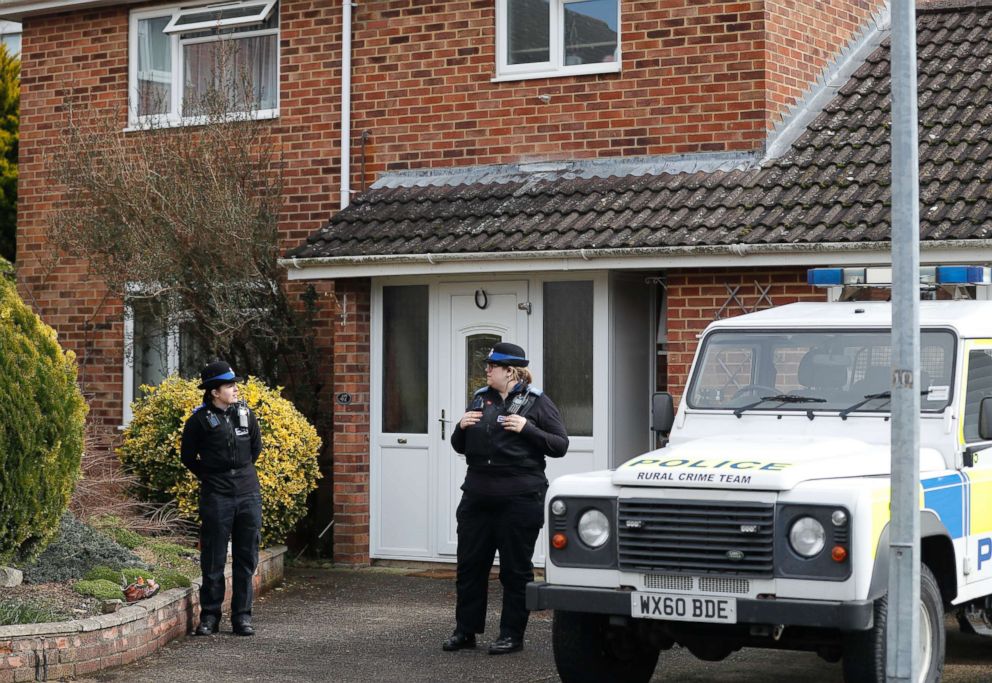 PHOTO: Police officers stand outside the house of former Russian double agent Sergei Skripal in Salisbury, England, March 6, 2018. British police believe Skripal his daughter first came into contact with a military-grade nerve agent at their front door.