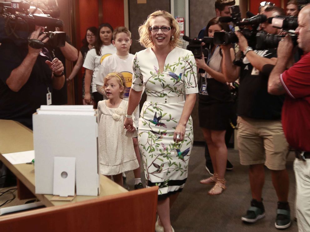 PHOTO: Rep. Kyrsten Sinema arrives to deliver her ballot signatures, May 29, 2018, at the Capitol in Phoenix. Sinema hopes to become the first Democrat to represent Arizona in the Senate in 30 years.