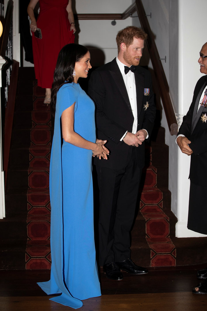 The duchess gave us serious Gwyneth Paltrow vibes with her caped dress.