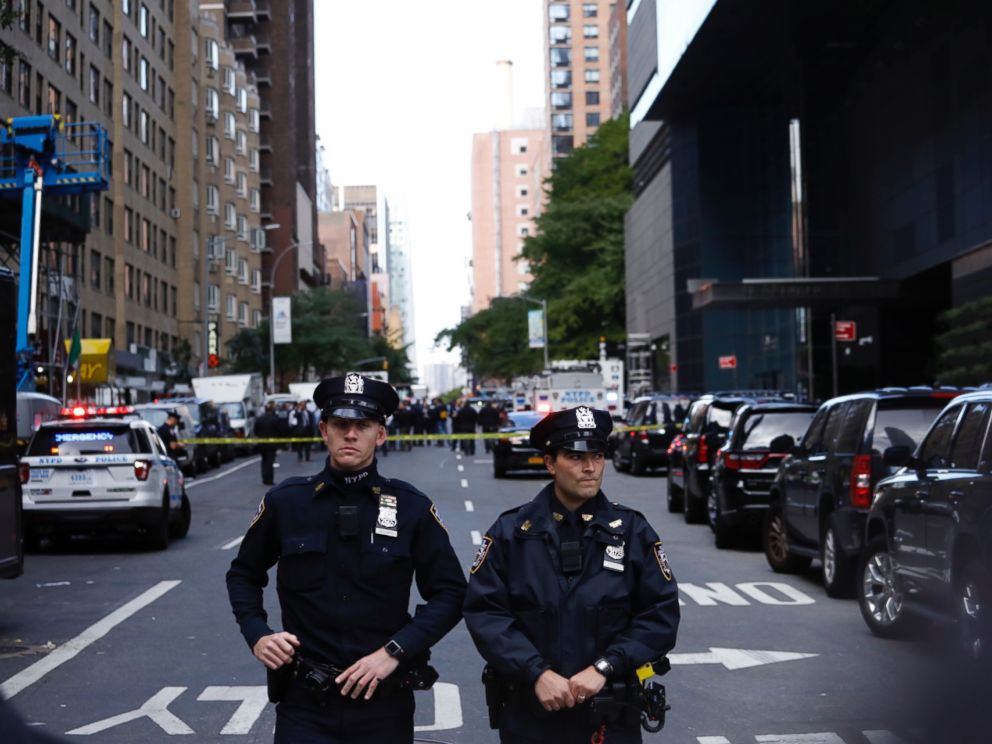 PHOTO: Police stand guard in a closed street after a bomb alert at the Time Warner offices in New York, Oct. 24, 2018. 