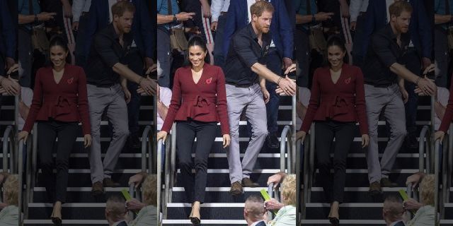 Britain's Prince Harry and Meghan, Duchess of Sussex arrive to watch the wheelchair basketball final at The Invictus Games in Sydney, Australia, Saturday, Oct. 27, 2018. Prince Harry and his wife Meghan are on day twelve of their 16-day tour of Australia and the South Pacific.(AP Photo)