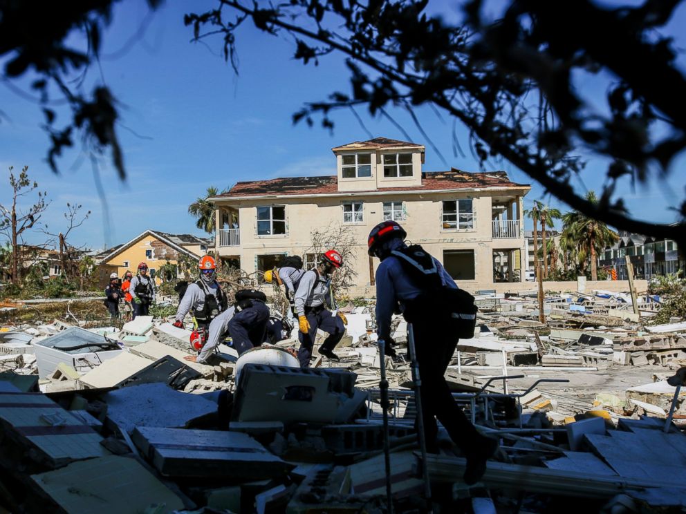 PHOTO: Members from South Florida Task Force search a flattened home destroyed by Hurricane Michael in Mexico Beach, Fla., Friday, Oct. 12, 2018, after Hurricane Michael went through the area on Wednesday.