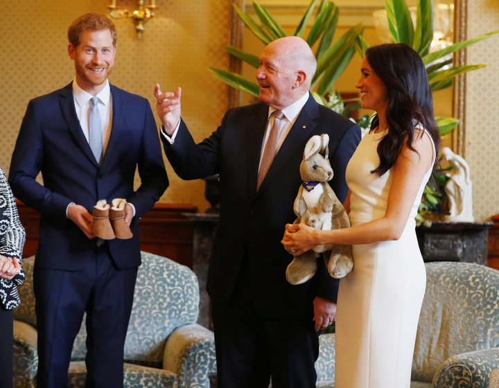 Australia's Governor General Peter Cosgrove gives the Duke and Duchess of Sussex a toy kangaroo - with a baby - at Admiralty 