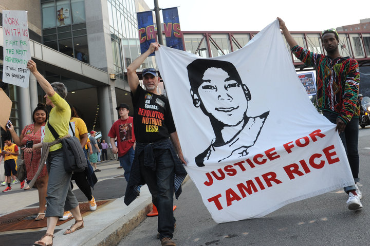 Demonstrators take to the streets of Cleveland to show support for Tamir Rice following the boy's police-shooting death in la