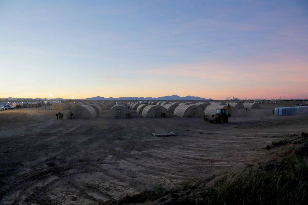 PHOTO: The sun sets on a tent city were soldiers continue to work through the night supporting U.S. Customs and Border Protection agency at Davis-Monthan Air Force Base, Ariz., Nov. 4, 2018.