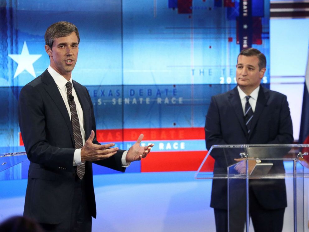 PHOTO: Rep. Beto ORourke speaks as Senator Ted Cruz looks on, during a debate in San Antonio, Texas, Oct. 16, 2018. 