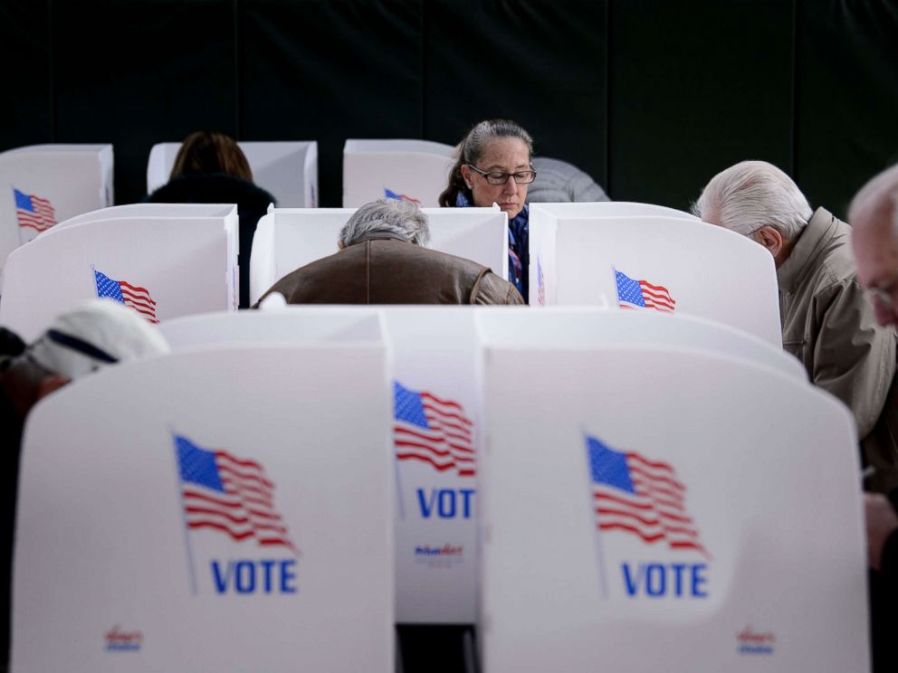 PHOTO: People cast their ballots at a community center during early voting Oct. 25, 2018 in Potomac, Md.