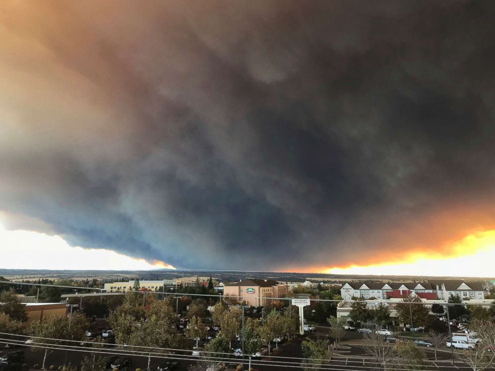 PHOTO: The massive plume from the Camp Fire, burning in the Feather River Canyon near Paradise, Calif., wafts over the Sacramento Valley as seen from Chico, Calif., Nov. 8, 2018. 