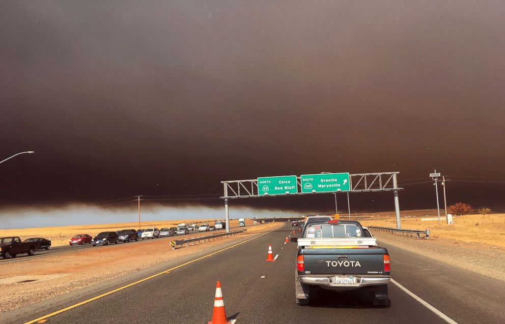 PHOTO: Smoke from the Camp Fire, burning in the Feather River Canyon near Paradise, Calif., darkens the sky as seen from Highway 99 near Marysville, Calif., Nov. 8, 2018. 