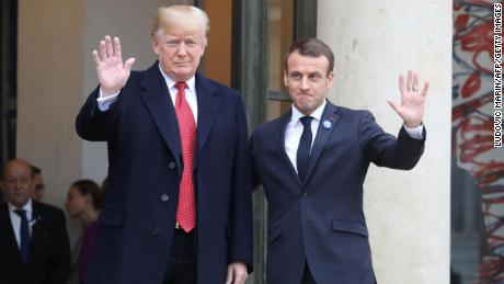 Trump, Macron gloss over differences in France after rough start