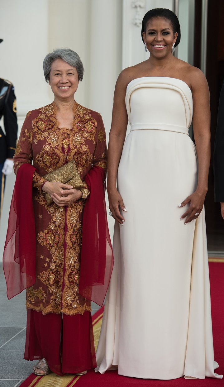 First lady Michelle Obama and Singapore's Ho Ching, wife of Prime Minister Lee Hsien Loong, before a state dinner at the Whit