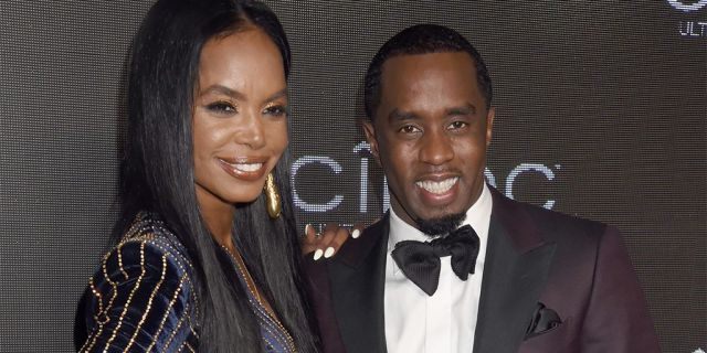 Kim Porter and Sean "Diddy" Combs are pictured here in 2015. According to TMZ, the model died on Thursday. She was 47. 