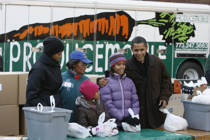 As president-elect in 2008, Obama and his family gave away care packages at a food bank in Chicago.