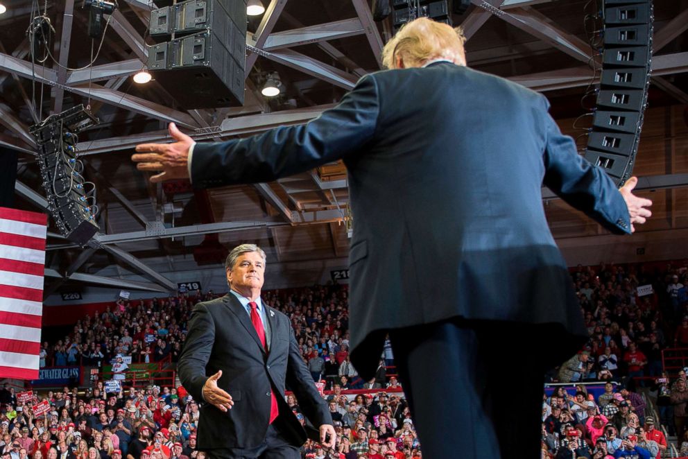 PHOTO: President Donald Trump greets talk show host Sean Hannity at a Make America Great Again rally in Cape Girardeau, Mo., Nov.r 5, 2018.