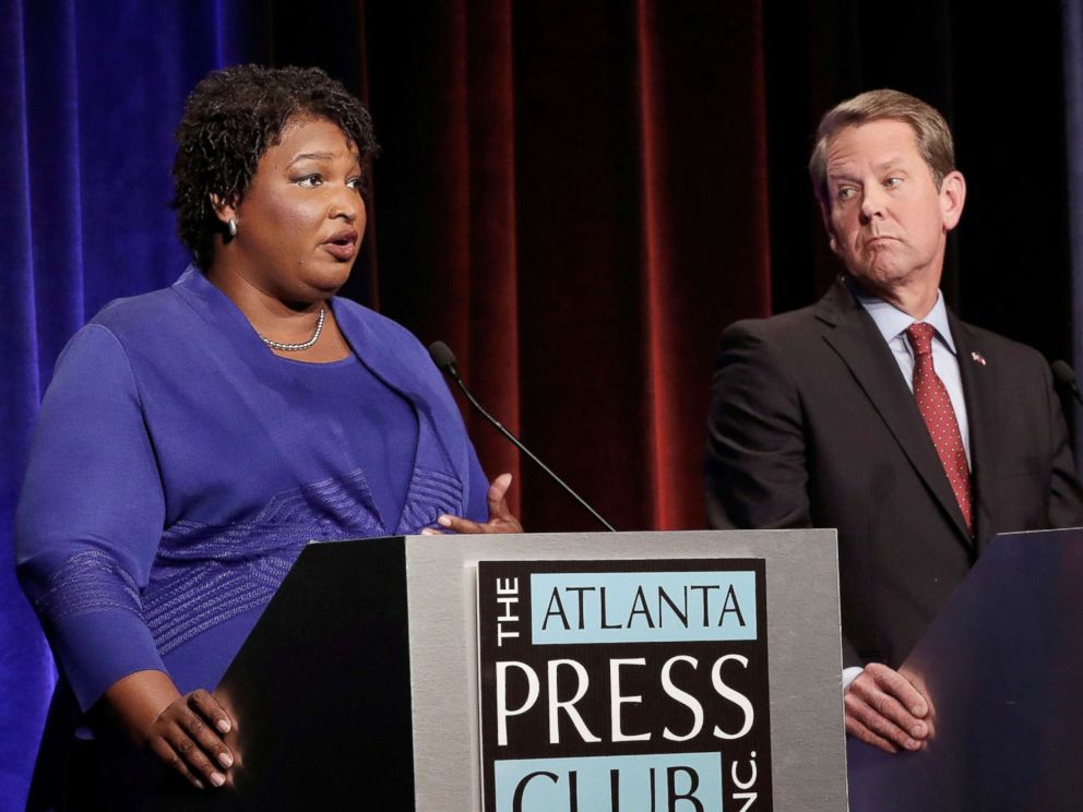 PHOTO: Democratic gubernatorial candidate for Georgia Stacey Abrams speaks, as Republican candidate Brian Kemp looks on, during a debate in Atlanta, Oct. 23, 2018.