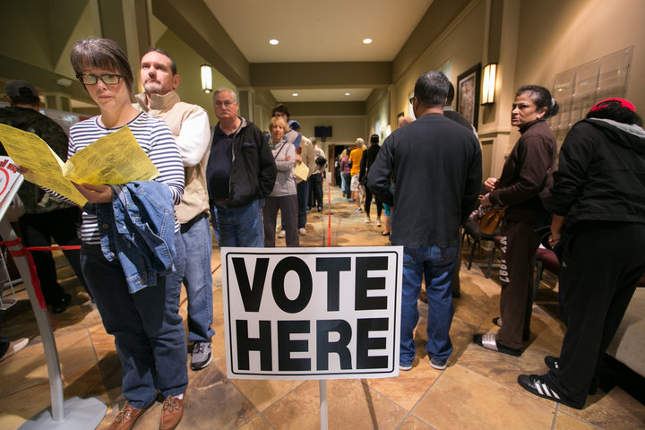 Voters line-up to cast their ballots at a polling station set up at Noonday Baptist Church for the mid-term elections on Nove