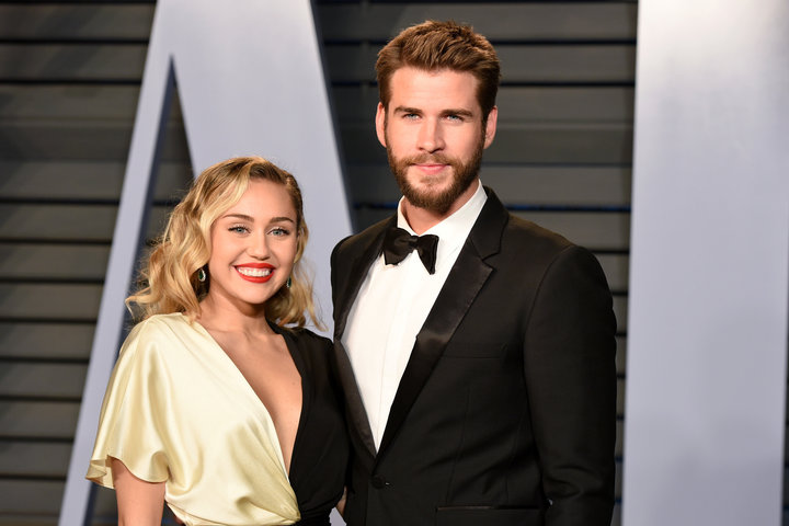 Miley Cyrus and Liam Hemsworth attend the 2018 Vanity Fair Oscar party on March 4 in Beverly Hills, CA.&nbsp;
