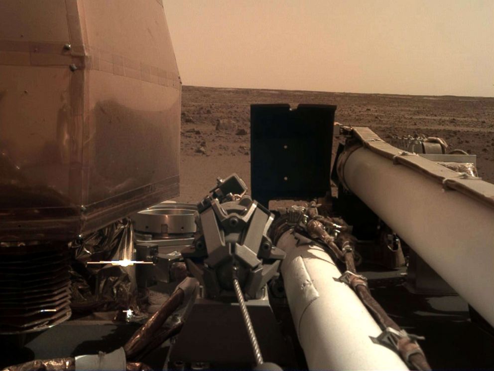 PHOTO: The NASA InSight took this photo of the surface of Mars using its robotic arm-mounted, Instrument Deployment Camera after touching down on the surface of the planet, Nov. 26, 2018.