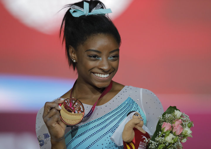 Simone Biles captured her fourth all-around title at the World Gymnastics&nbsp;Championships in Doha, Qatar, on Thursday.