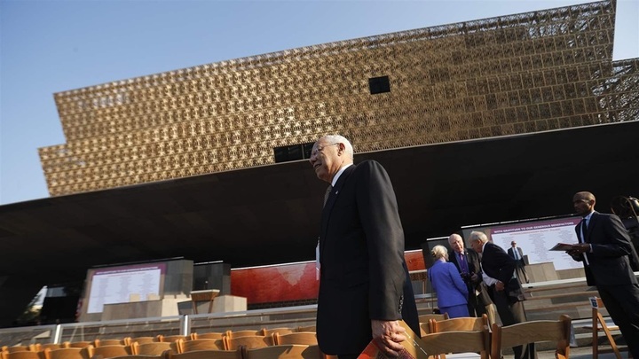 Former Secretary of State Colin Powell arrives for the dedication of the National Museum of African American History and Cult