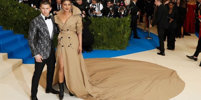 Nick Jonas and his now-wife Priyanka Chopra at the 2017 Met Gala where the couple met. Chopra donned a custom Ralph Lauren gown as she did on her wedding day. 
