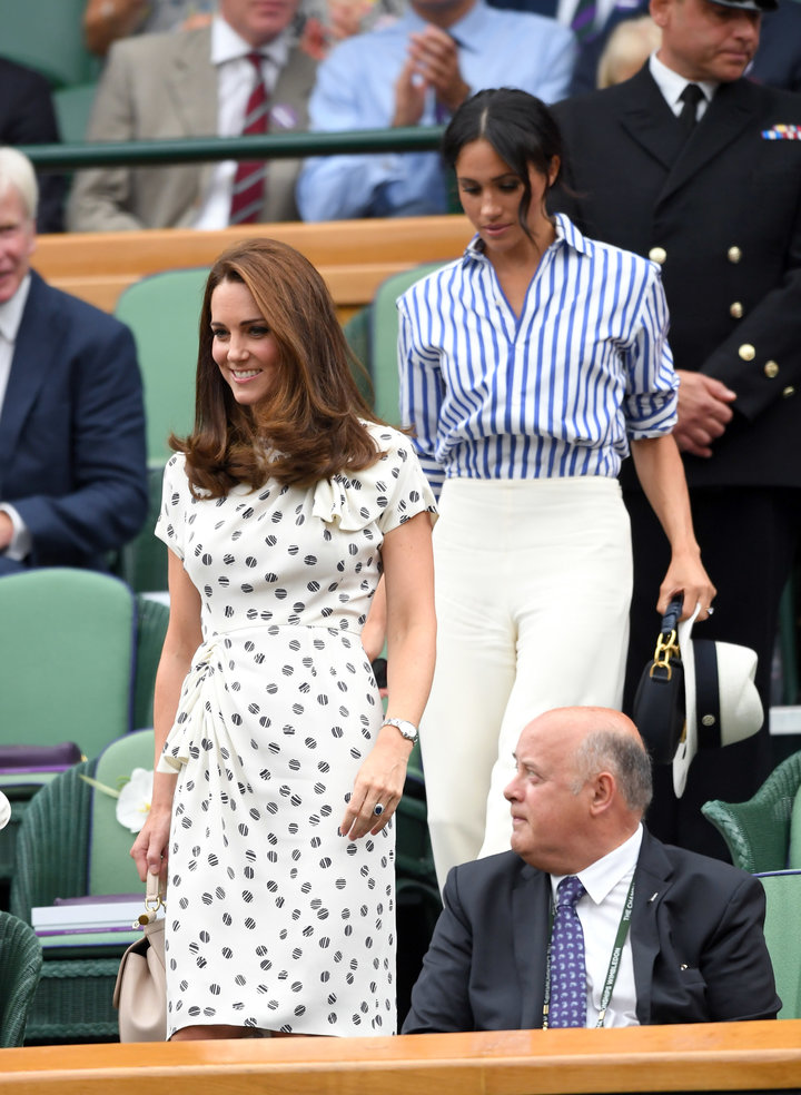 Catherine, Duchess of Cambridge and Meghan, Duchess of Sussex attend Day 12 of the Wimbledon Tennis Championships on July 14,