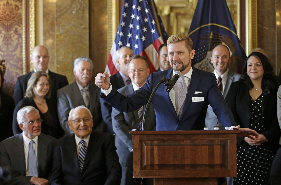 Equality Utah Executive Director Troy Williams (right) speaks after Utah lawmakers introduced a landmark anti-discrimination 