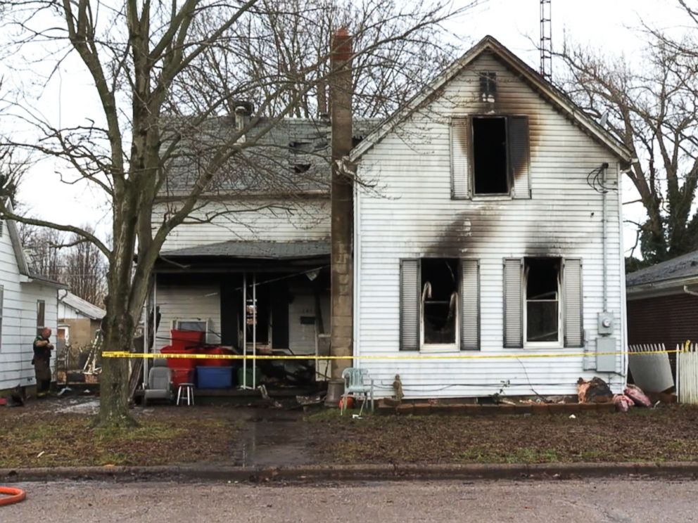 PHOTO: A yellow tape sits in front of a burned house after three children died and a mother and two siblings escaped a fire in Tell City, Ind., Dec. 28, 2018.