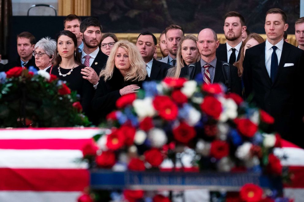PHOTO: People gather in the Rotunda of the U.S. Capitol to pay respects to former U.S. President George H.W. Bush, as the remains of the former president lie in state in Washington, D.C., Dec. 4, 2018.