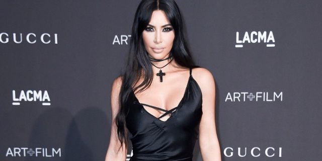 Kim Kardashian came under fire on Halloween for calling people who didn't recognize her costume the R-word.