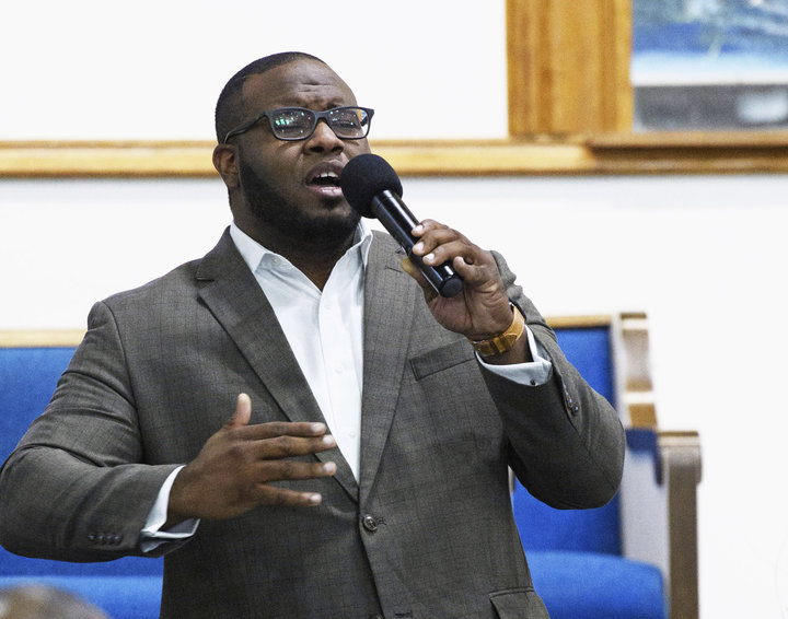 This Sept. 21, 2017 file photo provided by Harding University in Search, Ark., shows Botham Jean leading worship at a univers
