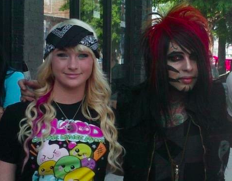 Tye Burns, one of Torres' alleged victims, is pictured with the singer in Arizona in May 2012.