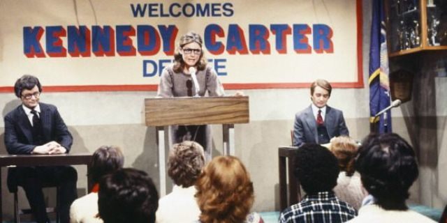 Bill Murray as Ted Kennedy, Jane Curtin as moderator, Brian Doyle-Murray as Jody Powell during "Kennedy-Powell Debate" skit on February 16, 1980. (NBC/NBCU Photo Bank via Getty Images)