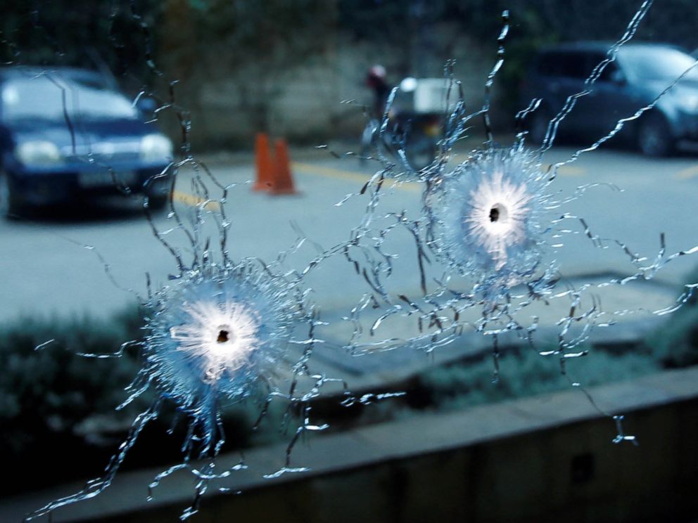 PHOTO: A glass damaged by bullets is seen at the scene where explosions and gunshots were heard at the Dusit hotel compound, in Nairobi, Kenya, Jan. 15, 2019.