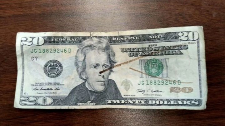 When the lunch lady marked the bill with a counterfeit pen it turned out to be fake, the boy's parents said.