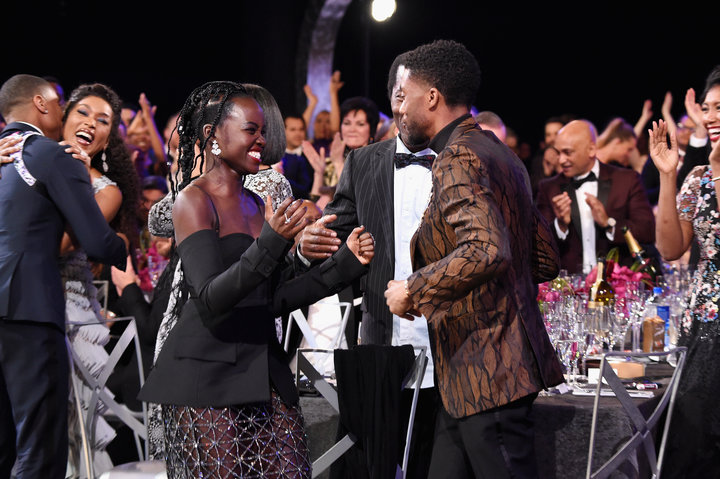 Nyong'o and Chadwick Boseman (right) after the "Black Panther" cast prize was announced at the SAG Awards.