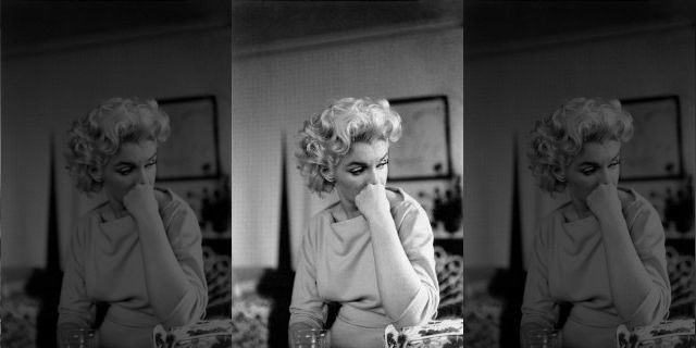NEW YORK - MARCH 24: Actress Marilyn Monroe relaxes on a couch in her hotel room at the Ambassador Hotel on March 24, 1955 in New York City, New York.