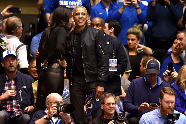 Check out the "44" on the sleeve of former President Barack Obama's bomber jacket.