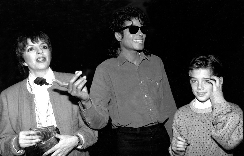 James Safechuck (right), then 10, with Michael Jackson and Liza Minnelli in 1988. The original photo caption refers to Safech