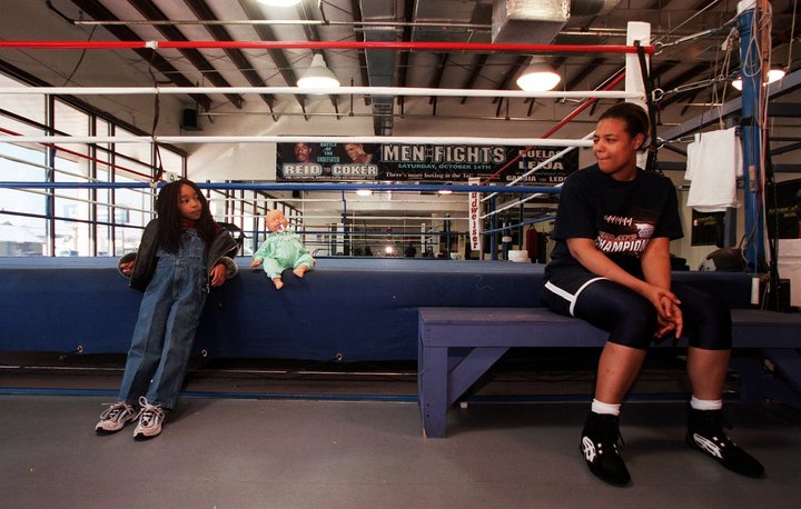 Freeda Foreman took a break from training with her daughter Justice at America Presents Gym in Denver.