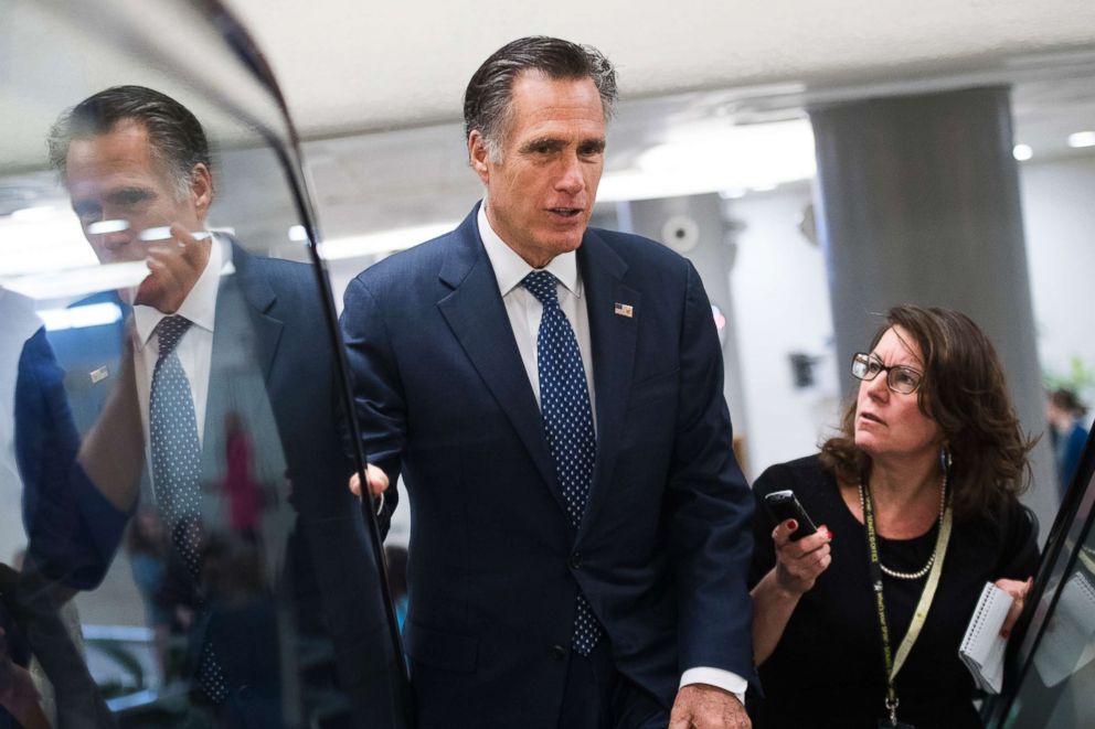 PHOTO: Sen. Mitt Romney talks with reporters before the Senate Policy luncheons in the Capitol, March 5, 2019.